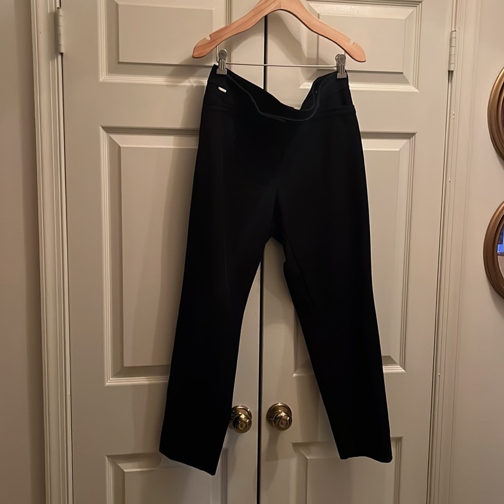 Newish black ankle pant Size 10, comfort stretch, pocket details front & back